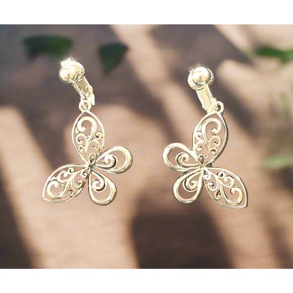 Clip on 1 1/2" silver and black cutout dangle butterfly earrings - Picture 4 of 4